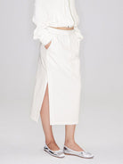 RARELY ALIKE Cotton Side Slit Midi Skirt in White - On Female Model