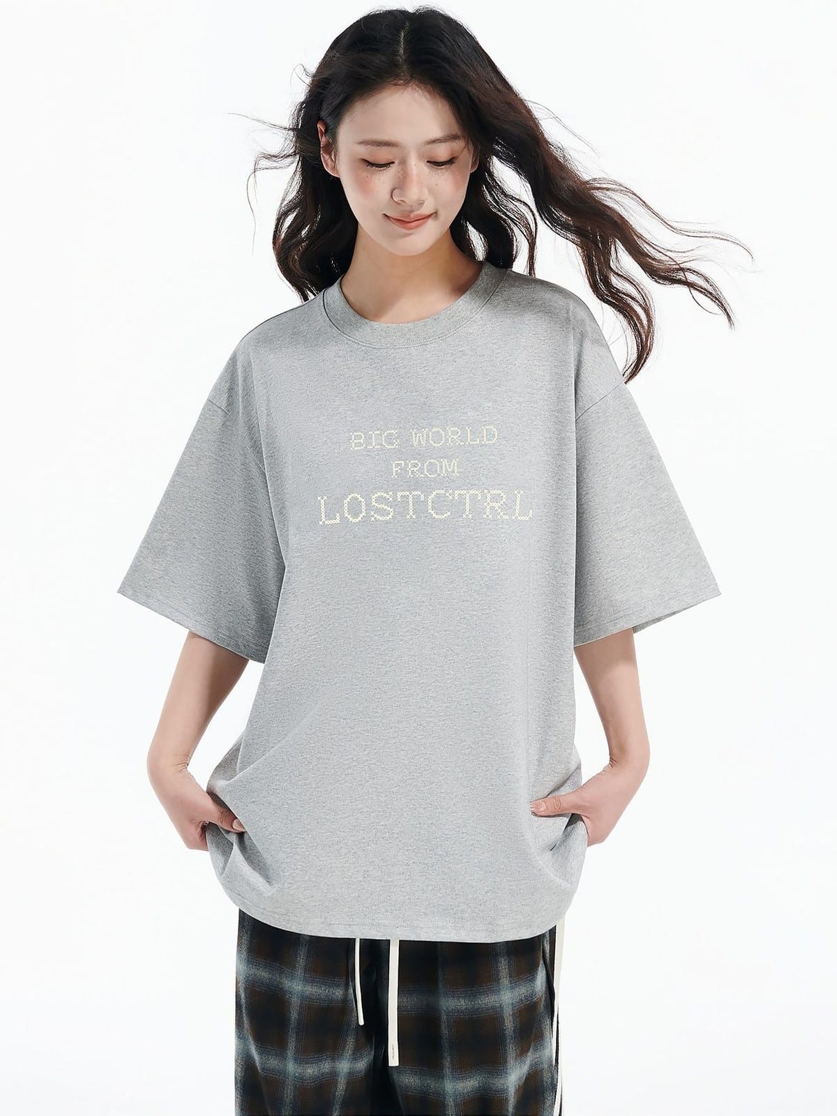 LOSTCTRL Cross Stitch Letter T Shirt in Gray - On Female Model
