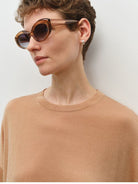 MSBEAST Sheer Lyocell Cashmere Half Sleeve T Shirt in Beige - On Female Model