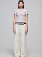 SIMPLE PROJECT Crinkled Straight Leg Trousers in White - On Female Model