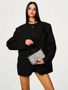 SMFK Cross Badge Leather Shoulder Bag in White - On Female Model
