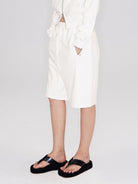RARELY ALIKE Cotton Drawstring Sweat Shorts in White - On Model