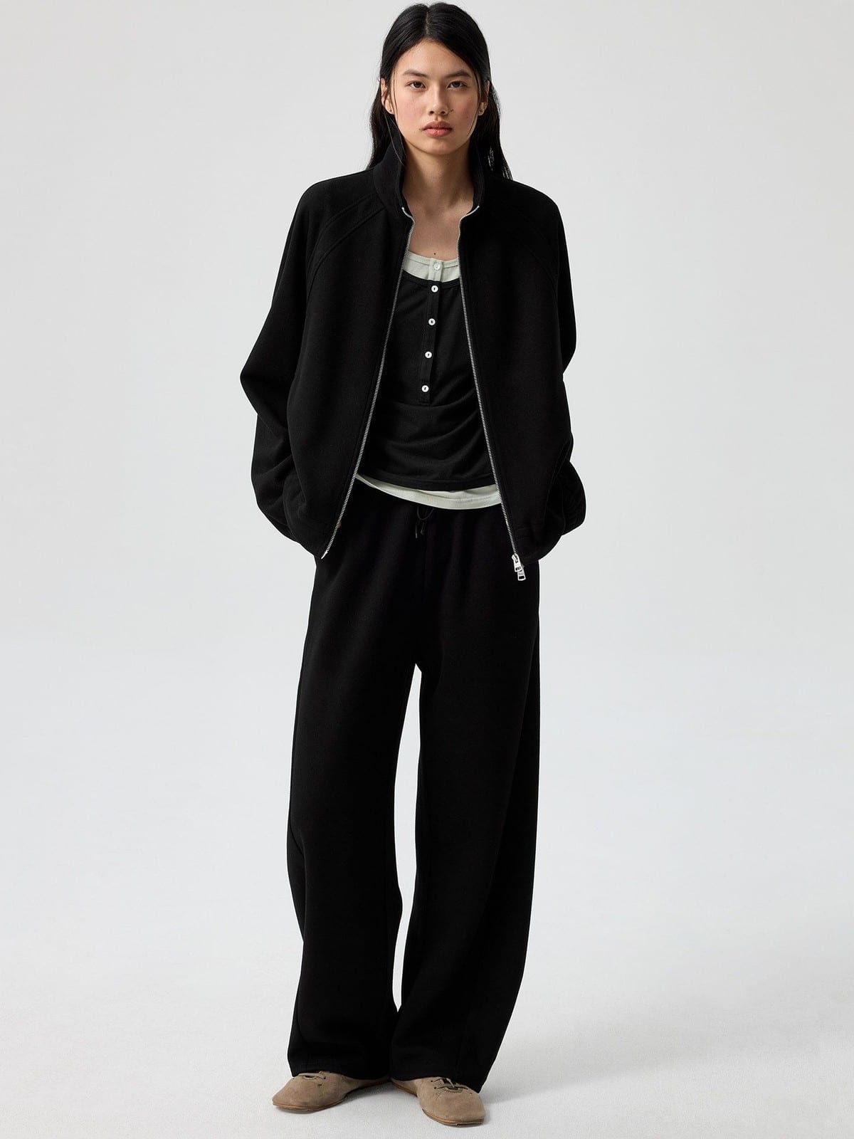 SIMPLE PROJECT Ruffled Adjustable Collar Zip Hoodie in Black - On Female Model