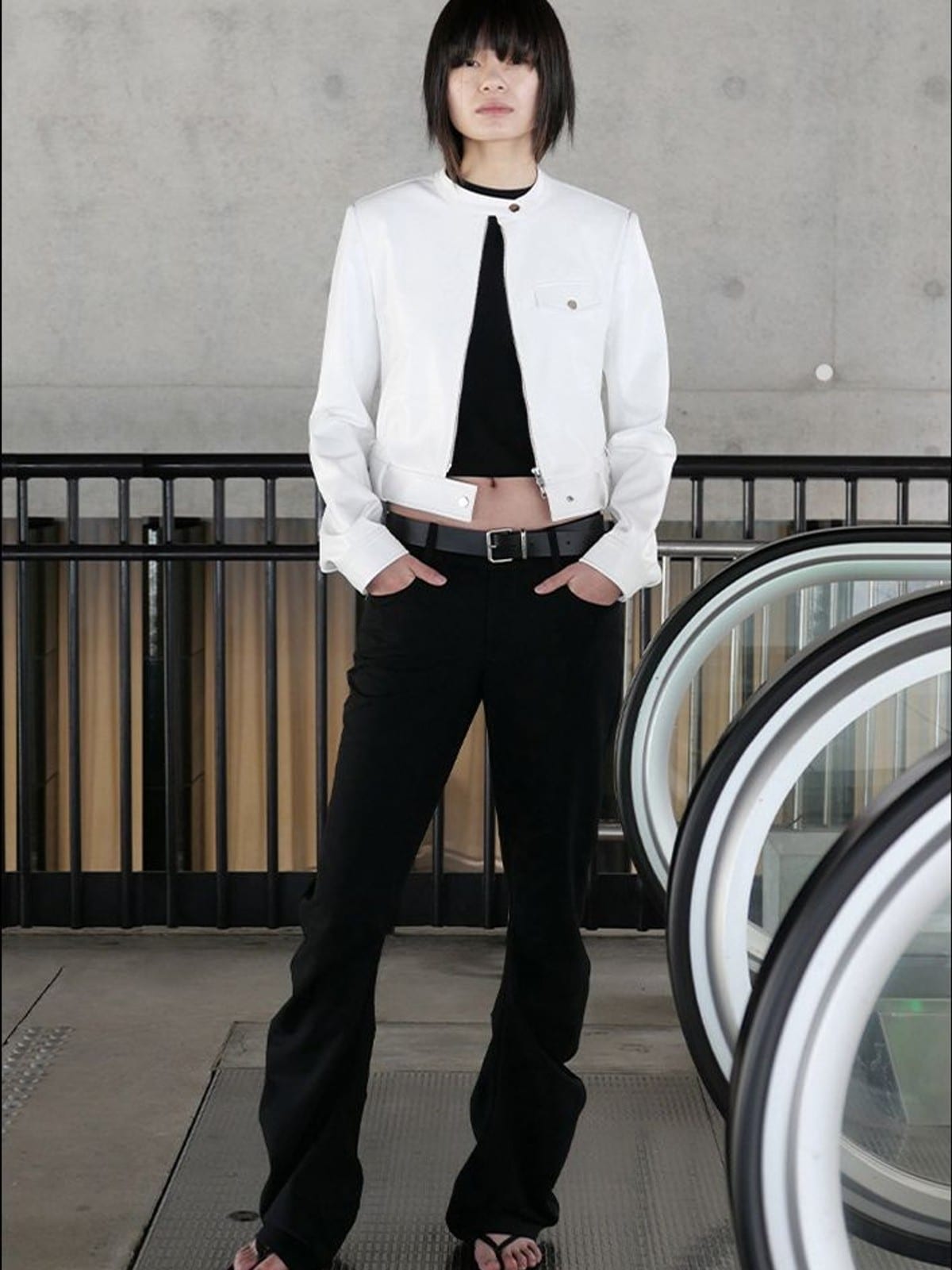 RARELY ALIKE Curved Leg Flared Dress Pants in Black - On Female Model
