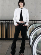 RARELY ALIKE Curved Leg Flared Dress Pants in Black - On Female Model