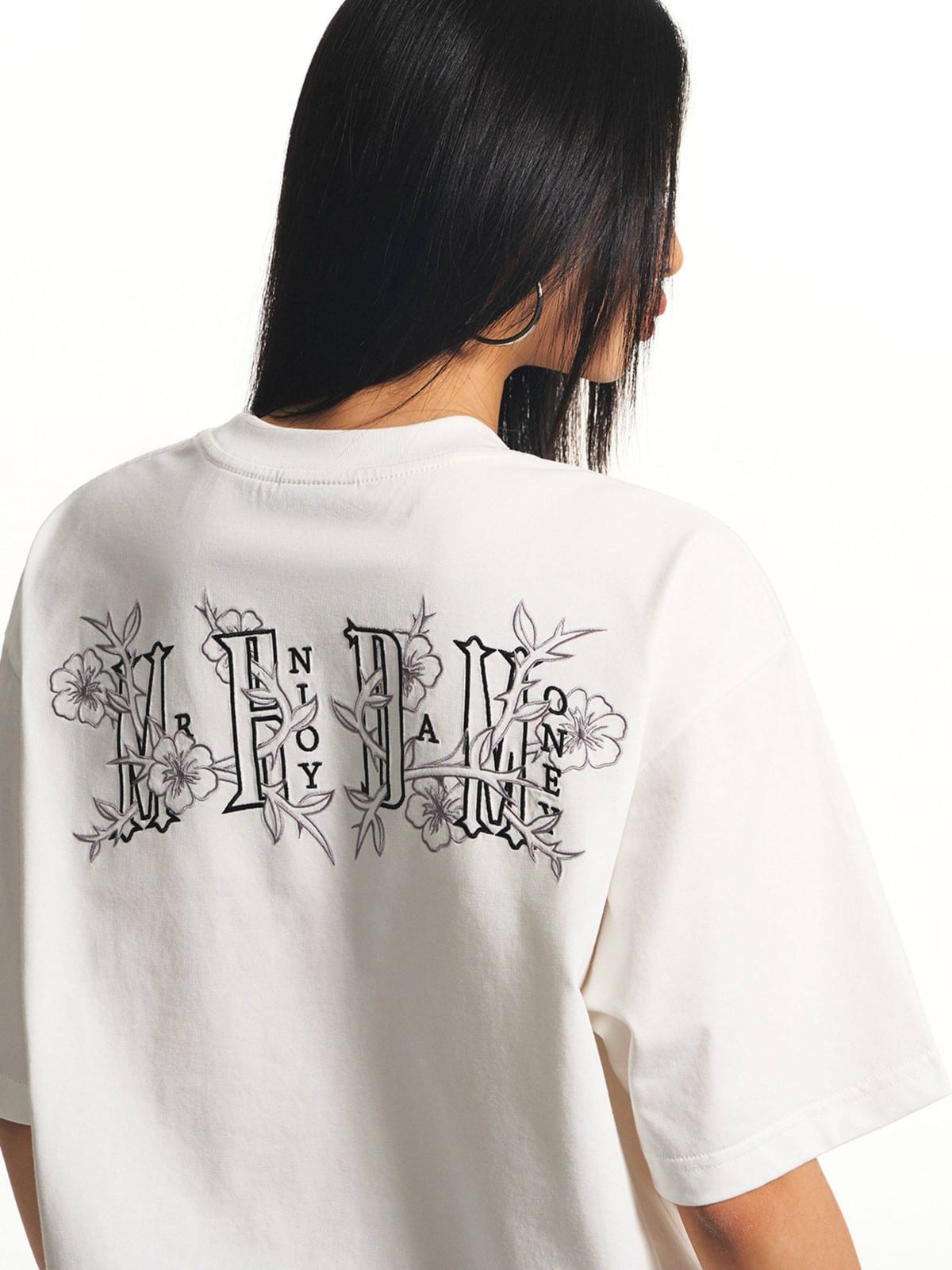 MEDM Floral Graphic Cotton Sorona T Shirt in White - On Female Model
