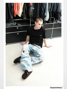 UNKNOWNWORLD Small Logo Cotton T Shirt in Black - On Male Model