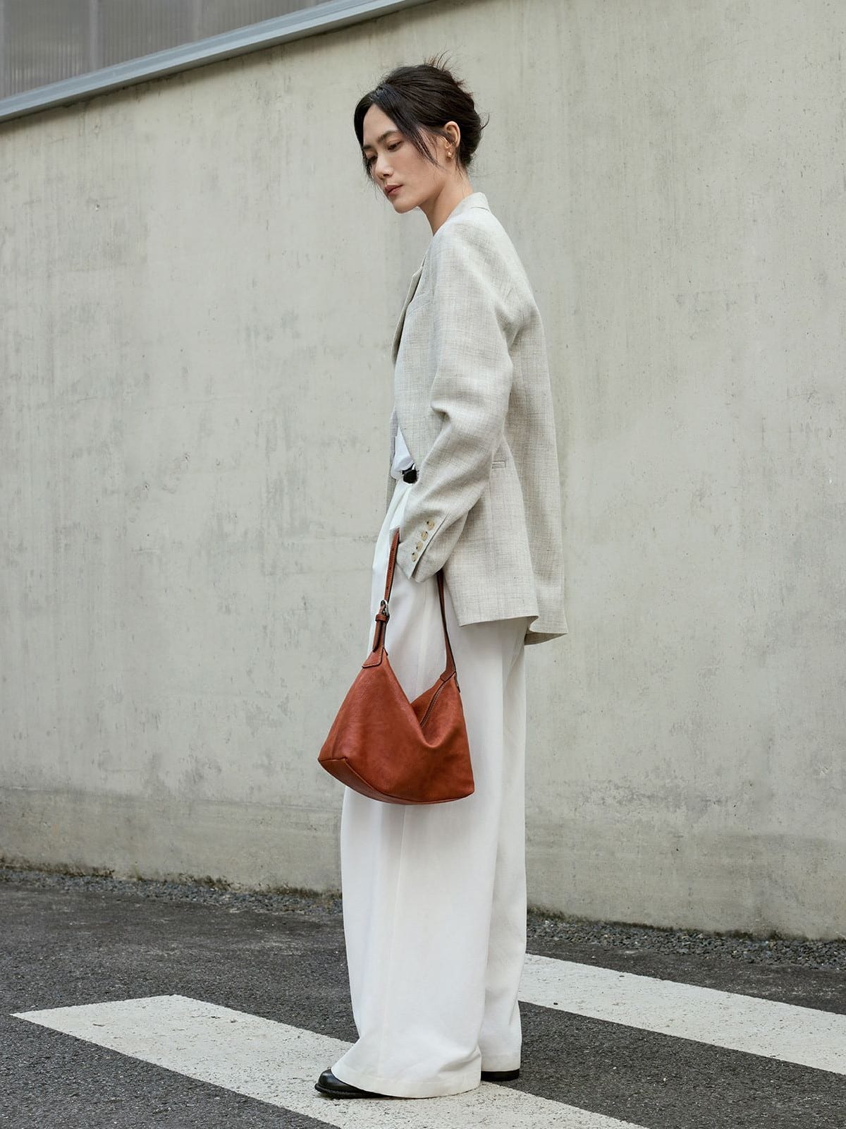 QIUZHEN Vegetable Tanned Calfskin Hobo Bag in Gray - On Female Model