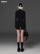 SMFK Cropped Stretch Nylon Track Jacket in Black - On Model