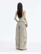 MEDM Crinkled Nylon Parachute Cargo Pants in Beige - On Model