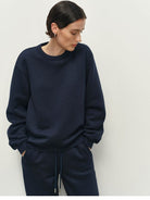 MSBEAST Fleece Lined Cotton Sweatshirt Pants Set in Navy Blue - On Female Model