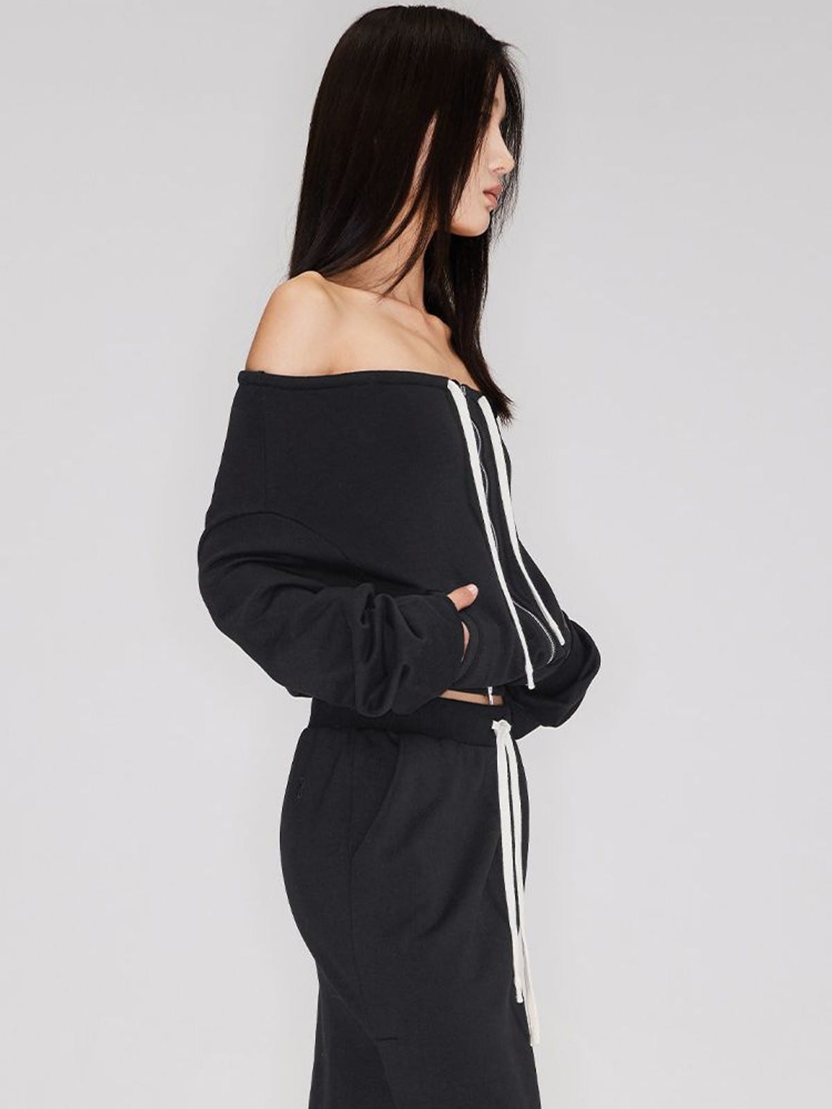RARELY ALIKE Off Shoulder Zip Up Sweatshirt in Black - On Female Model