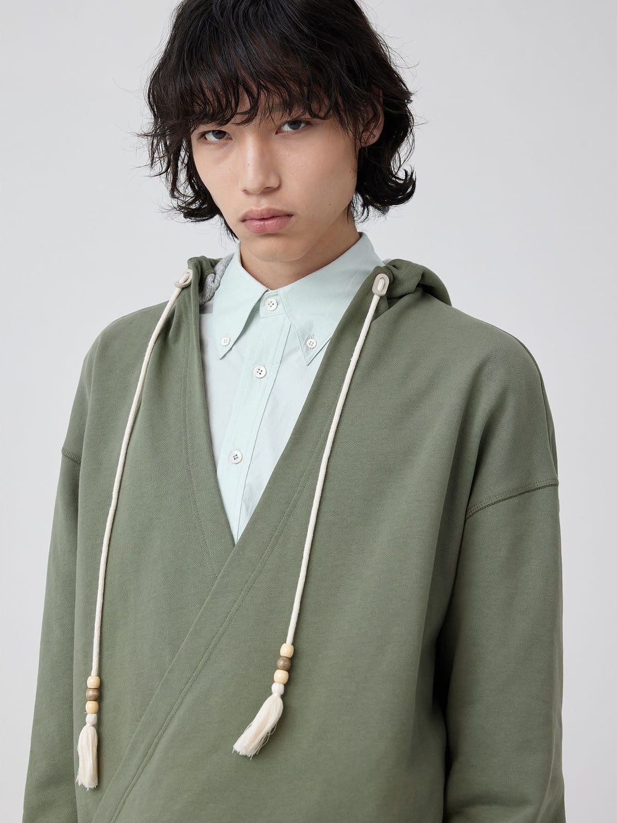 SIMPLE PROJECT Overlapping Slant Placket Hoodie in Olive - On Male Model