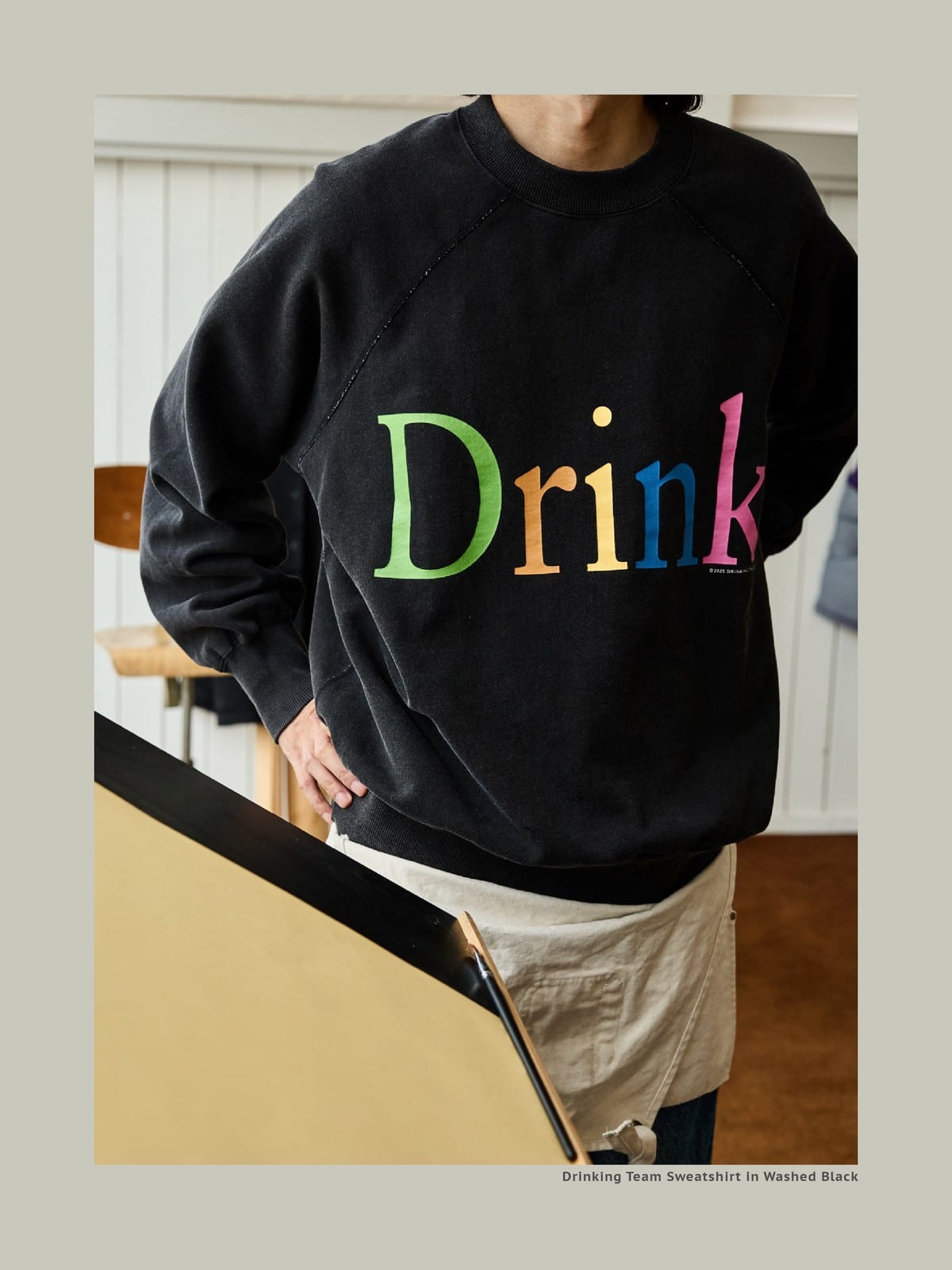 USAGE Washed Cotton Graphic Sweatshirt in Black - On Male Model
