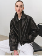 MSBEAST Cropped Leather Drawstring Jacket in Black - On Female Model