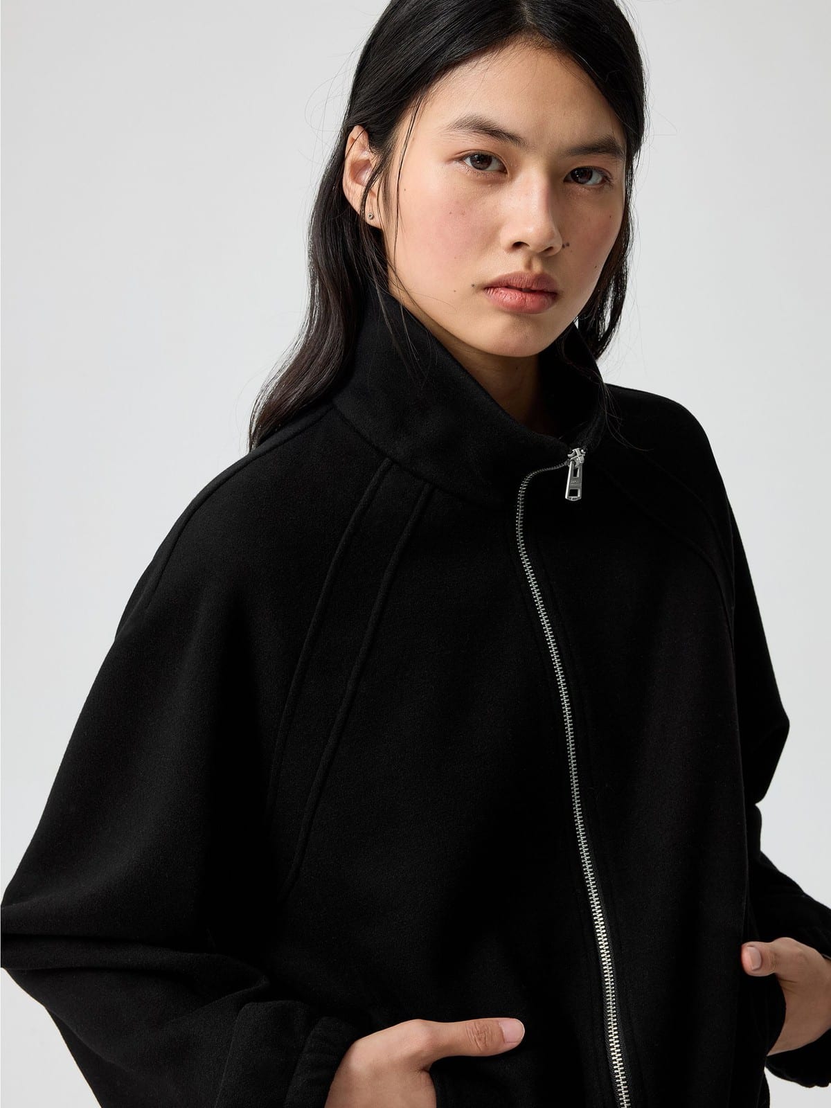 SIMPLE PROJECT Ruffled Adjustable Collar Zip Hoodie in Black - On Female Model
