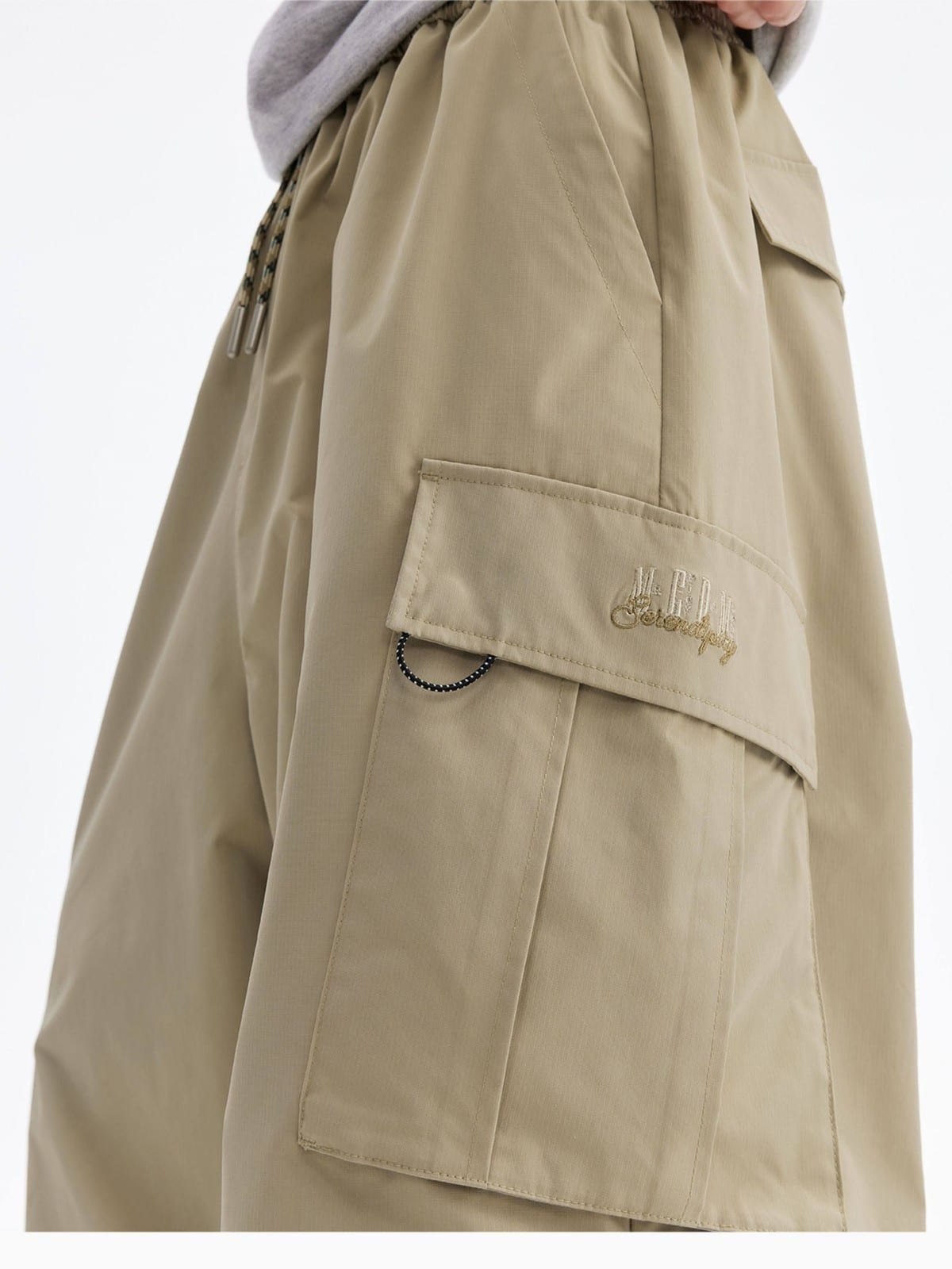 MEDM Multi Pocket Parachute Cargo Pants in Beige - On Model