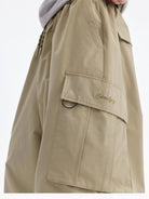 MEDM Multi Pocket Parachute Cargo Pants in Beige - On Model