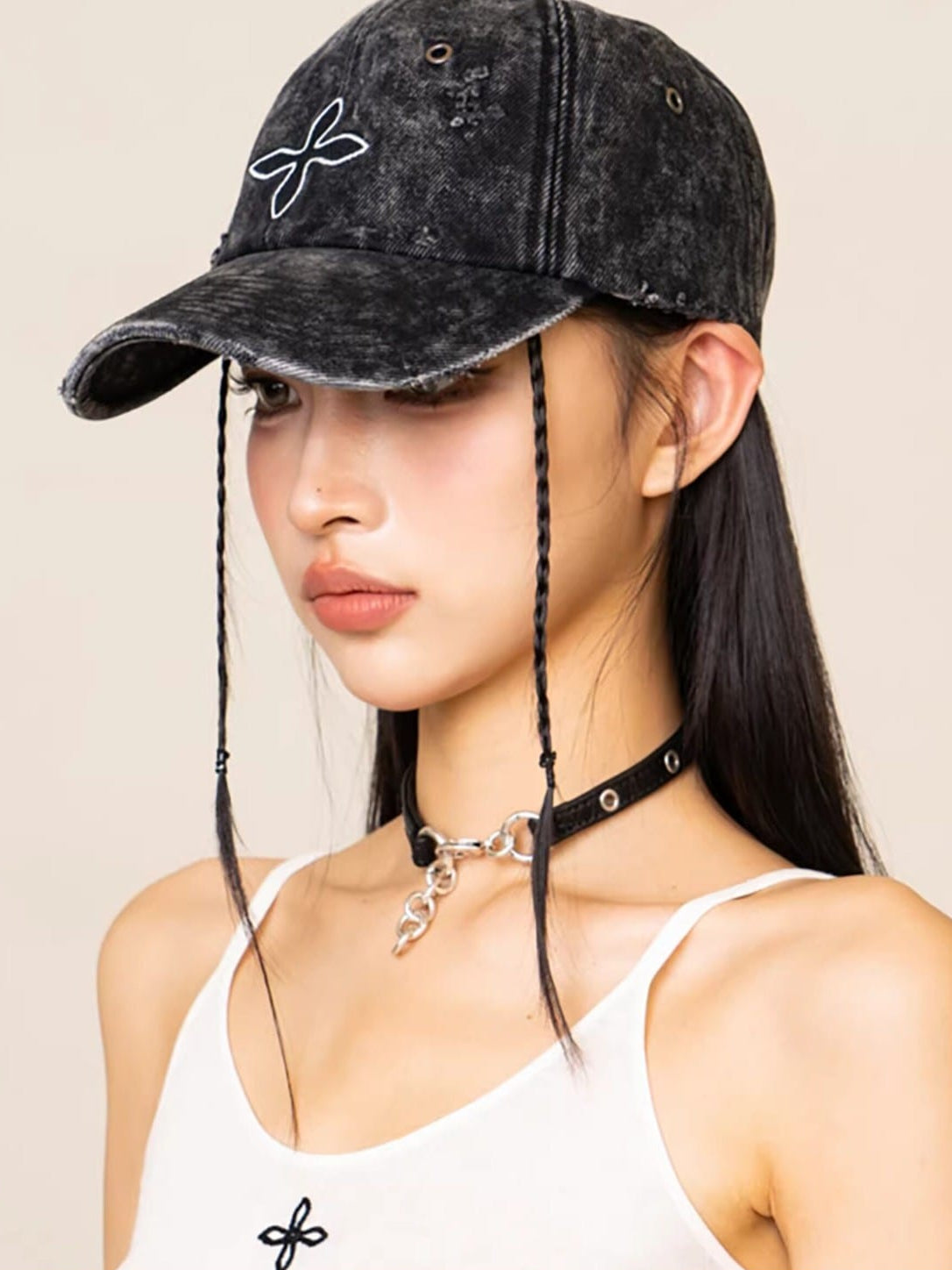 SMFK Distressed Cross Embroidered Baseball Cap in Black - On Female Model