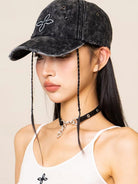 SMFK Distressed Cross Embroidered Baseball Cap in Black - On Female Model