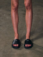SMFK Leather Cross Detail Slide Sandals in Black - On Model