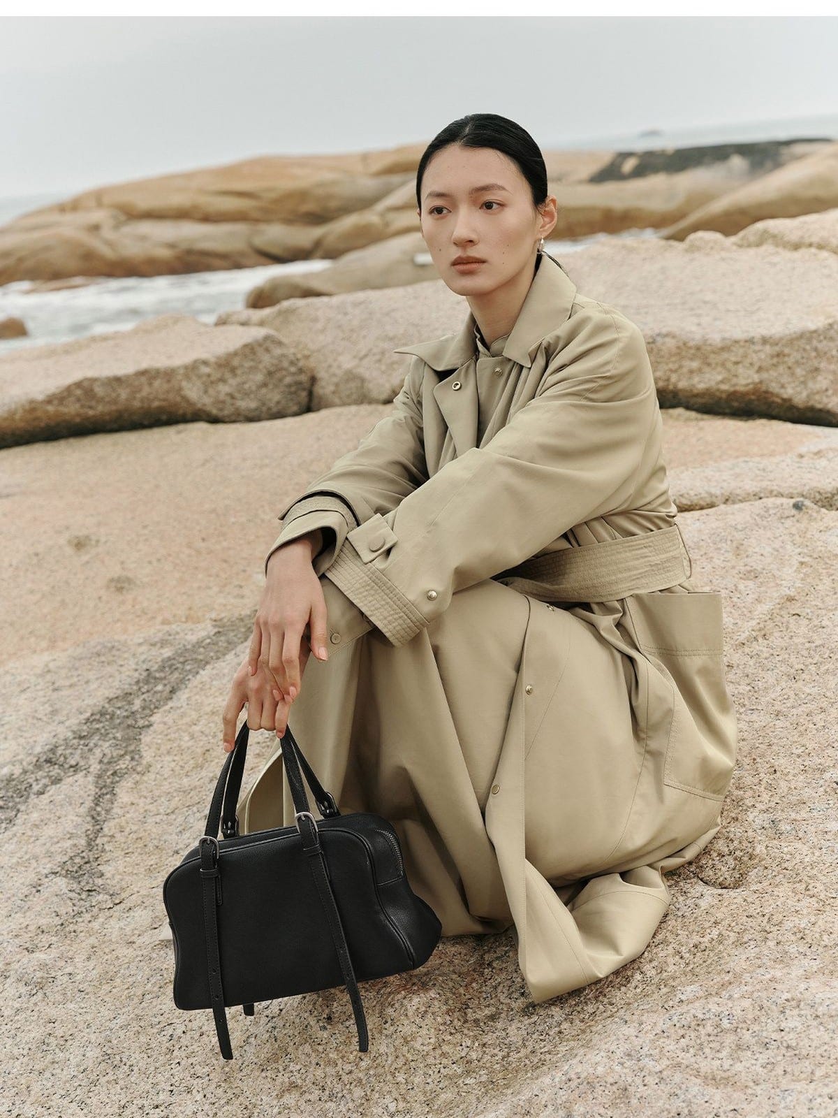 QIUZHEN Vegetable Tanned Kidskin Bowling Bag in Black - On Female Model