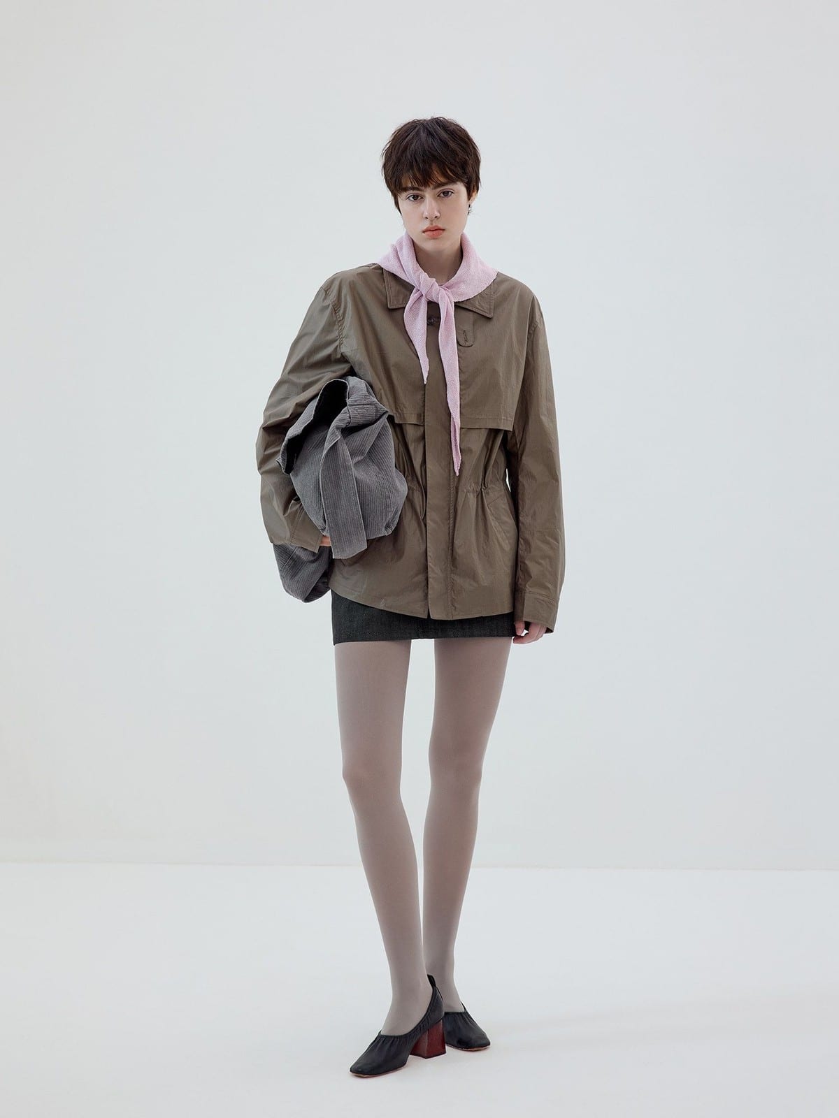 SIMPLE PROJECT Coated Drawstring Hunting Jacket in Beige - On Female Model