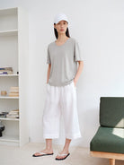 MSBEAST Rolled Edge Silk Cotton U Neck T Shirt in Gray - On Female Model