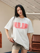 MEDM Glitch Logo Graphic Cotton T Shirt in Gray - On Female Model