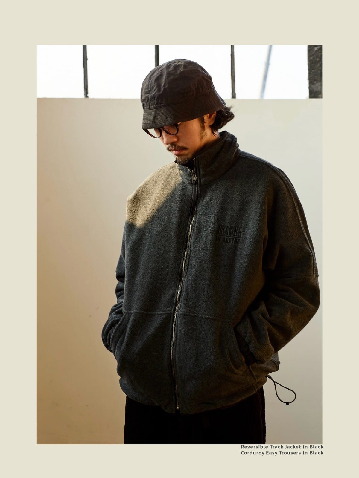 USAGE Reversible Nylon Fleece Track Jacket in Black - On Male Model