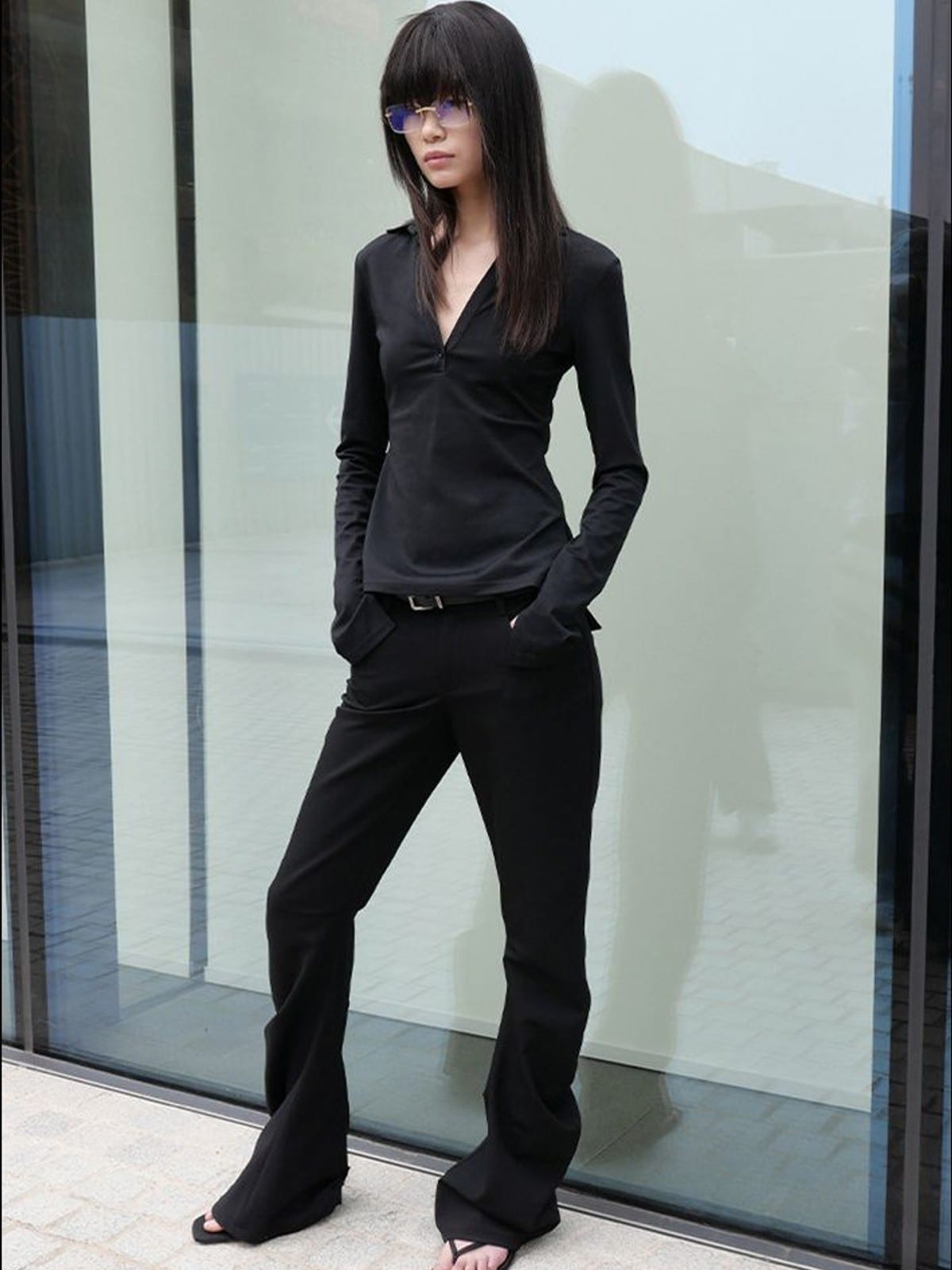 RARELY ALIKE Curved Leg Flared Dress Pants in Black - On Female Model