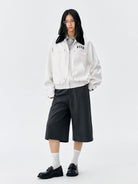 MEDM Embroidered Harrington Jacket in White - On Female Model