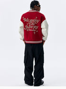 MEDM Pearl Embellished Varsity Jacket in Burgundy - On Male Model