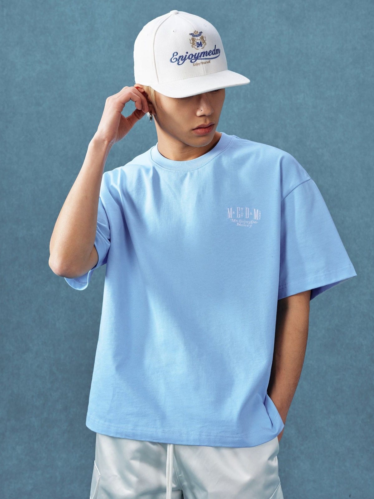 MEDM Letter Embroidery Cotton T Shirt in Sky Blue - On Male Model