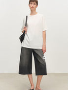 MSBEAST Oversized Lyocell Wool Blend T Shirt in White - On Female Model