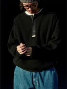 USAGE Heavyweight Waffle Knit Henley Sweatshirt in Black - On Male Model