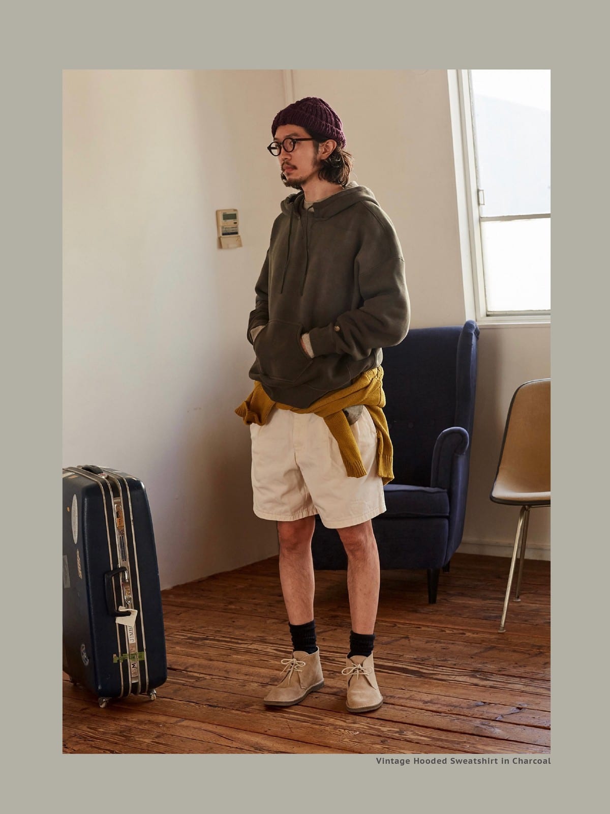 USAGE Faded Vintage Wash Hoodie in Olive - On Male Model
