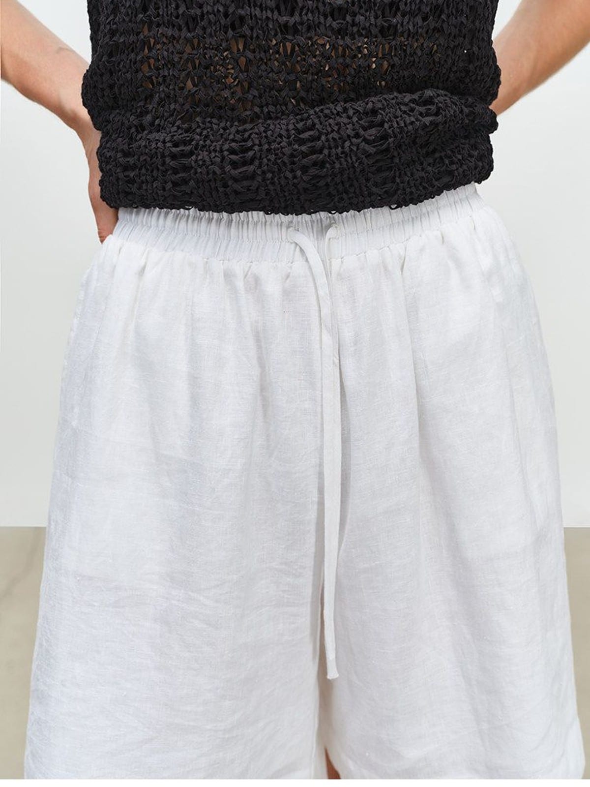 MSBEAST 100 Linen Knee Length Shorts in White - On Model