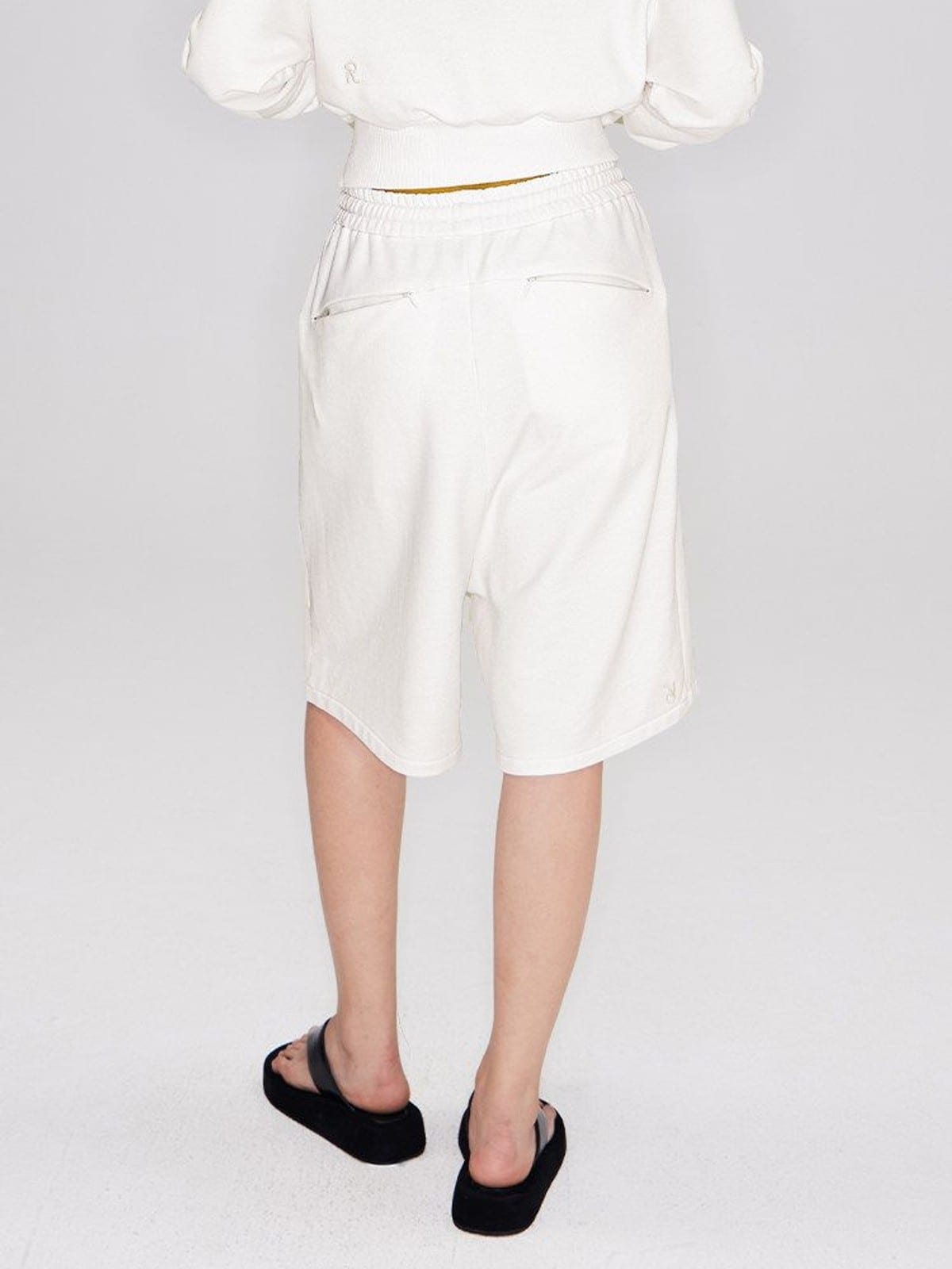RARELY ALIKE Cotton Drawstring Sweat Shorts in White - On Model