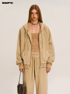 SMFK Distressed Washed Cotton Zip Up Hoodie in Beige - On Female Model