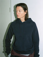 Random Piece Cotton Lyocell Cropped Hoodie in Navy Blue - On Female Model