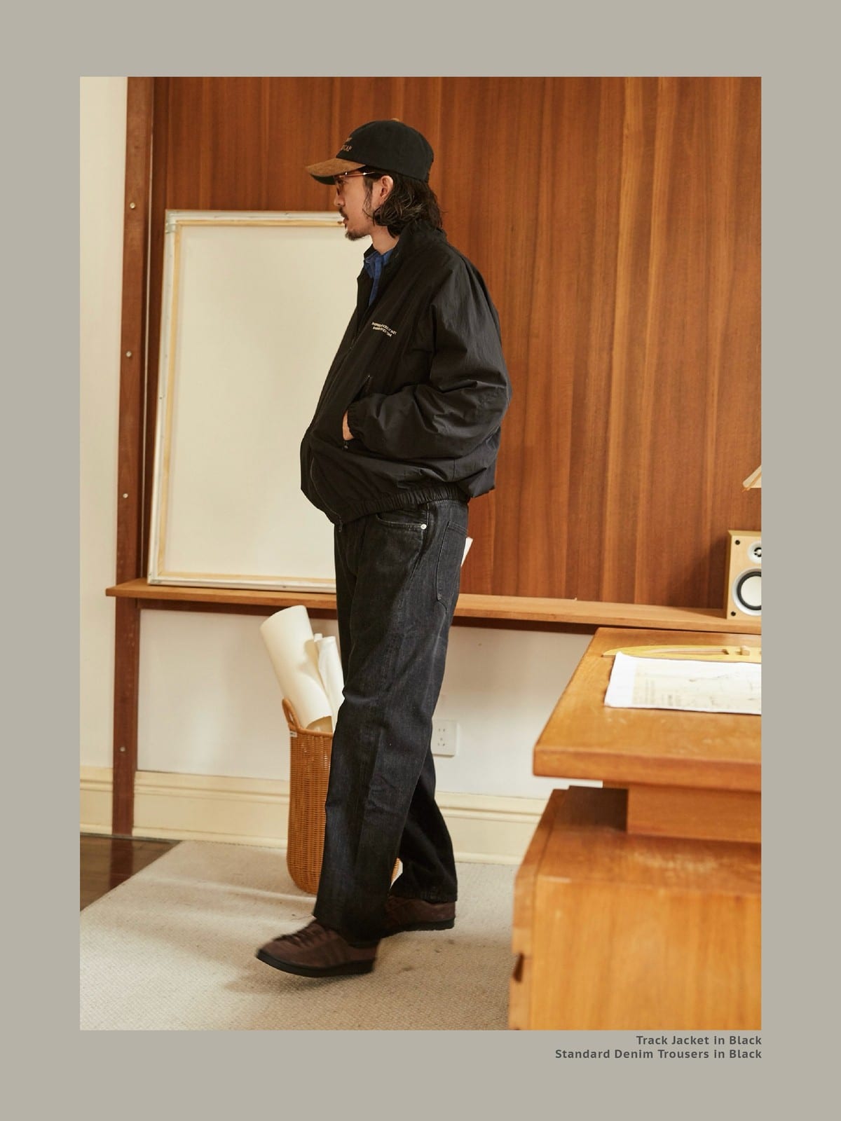 USAGE Heavily Washed Selvedge Denim Jeans in Black - On Male Model