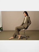 TEASEL Merino Wool Pleated Trousers in Olive - On Female Model