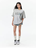 MEDM Vintage Logo Typography Cotton T Shirt in Heather Gray - On Female Model