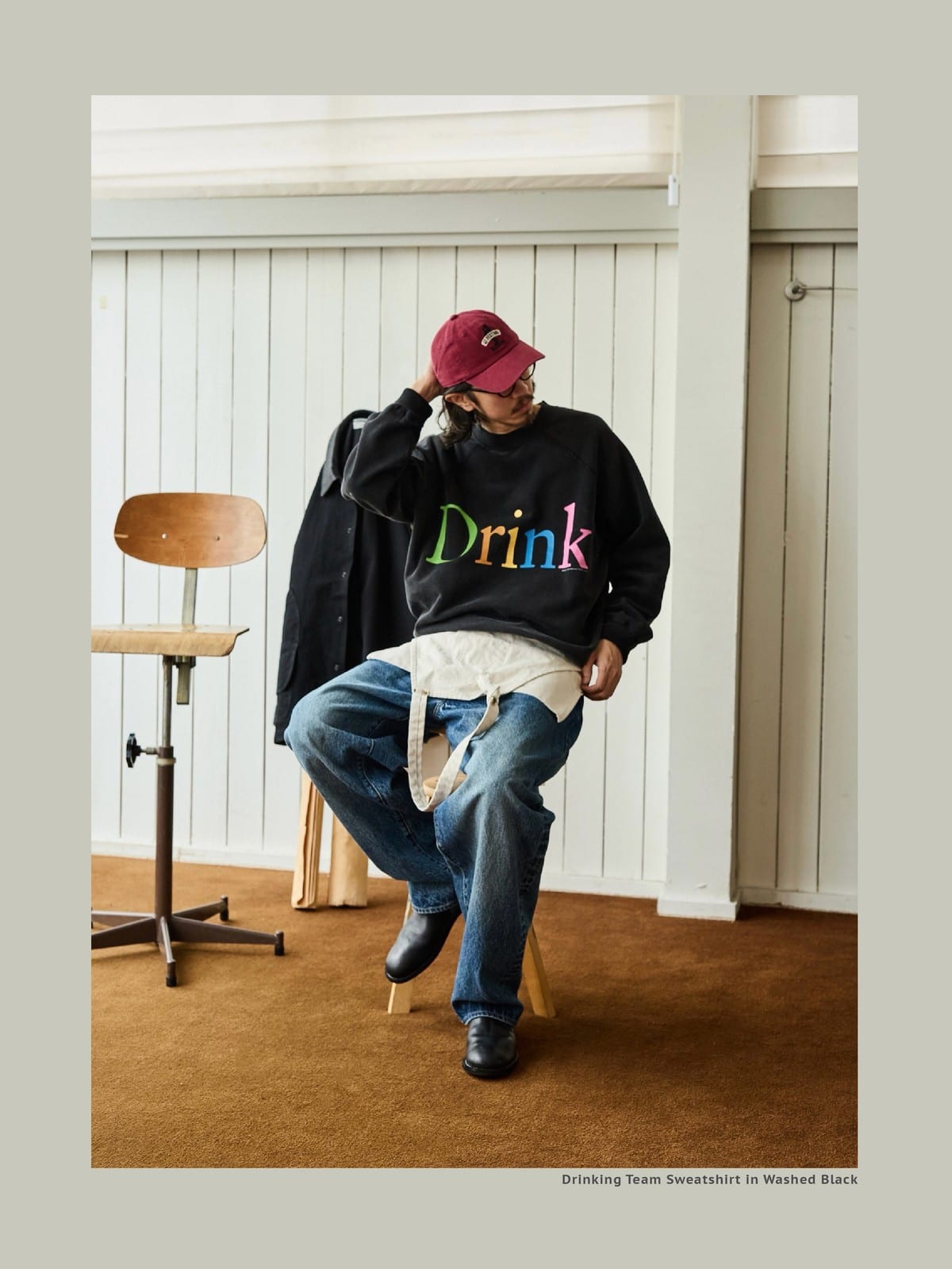 USAGE Washed Cotton Graphic Sweatshirt in Black - On Male Model