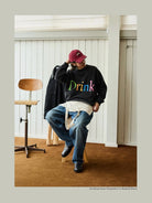 USAGE Washed Cotton Graphic Sweatshirt in Black - On Male Model