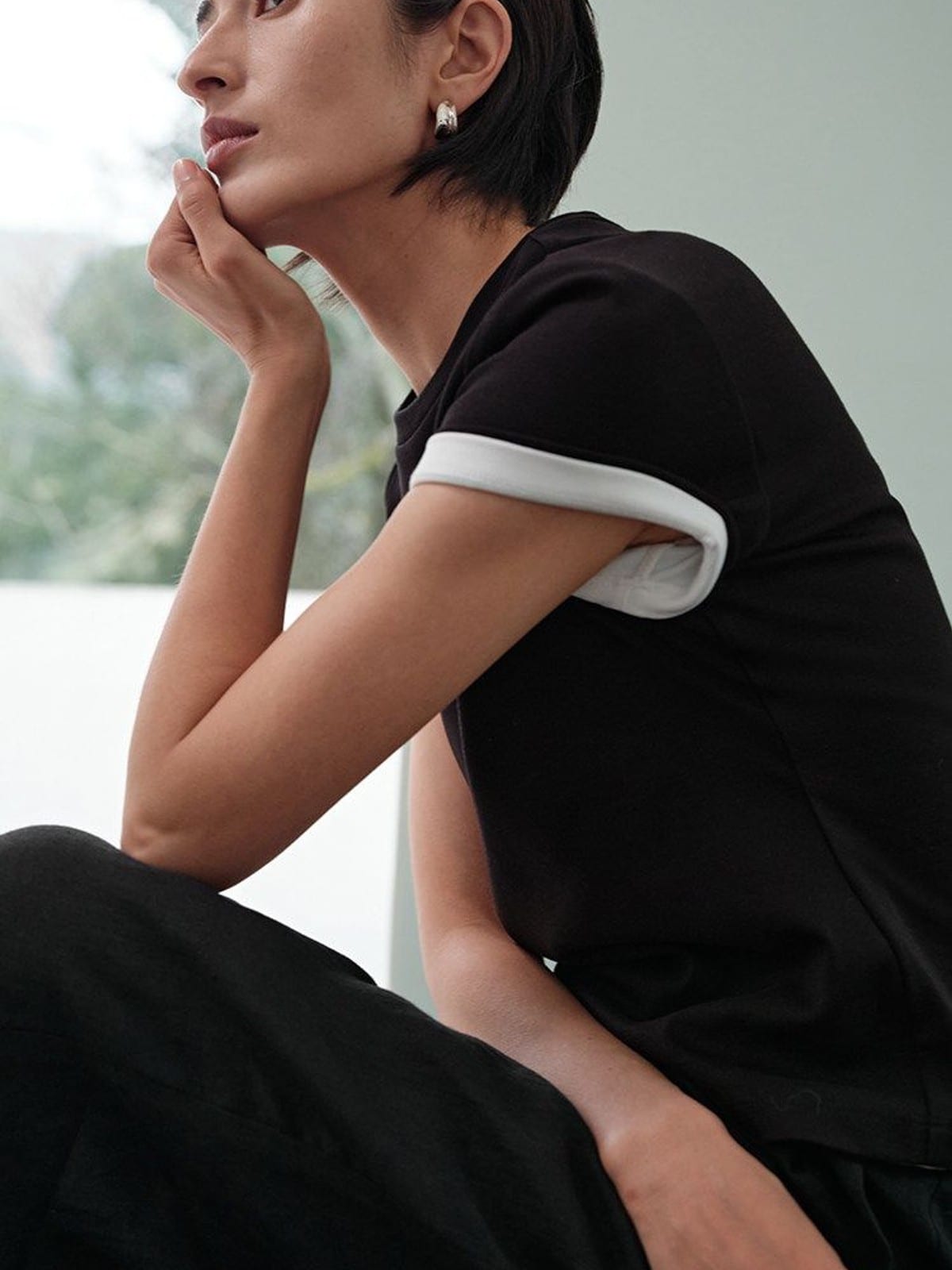 MSBEAST Cotton Blend Tapered Waist T Shirt in Black - On Female Model