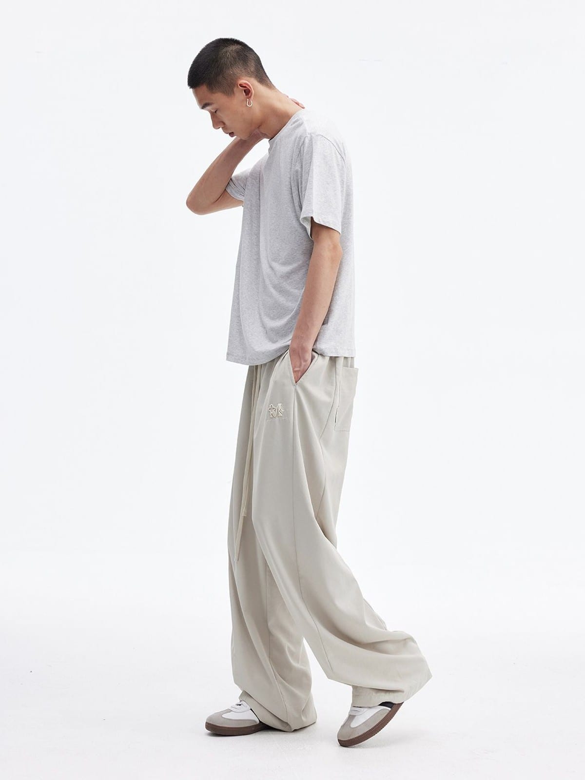 MEDM Lightweight Wide Leg Track Pants in White - On Male Model