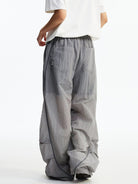 MEDM Glossy Piped Techwear Track Pants in Light Gray - On Model