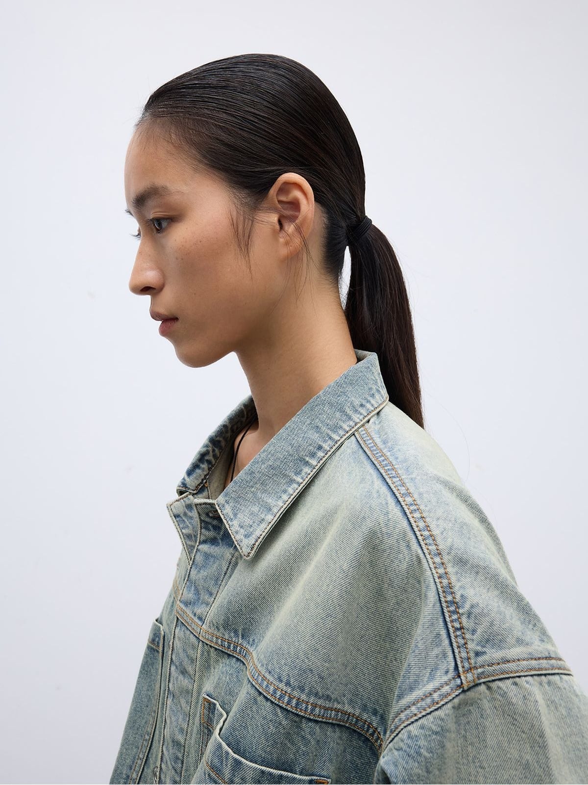 Random Piece Washed Cotton Cropped Denim Jacket in Sky Blue - On Female Model